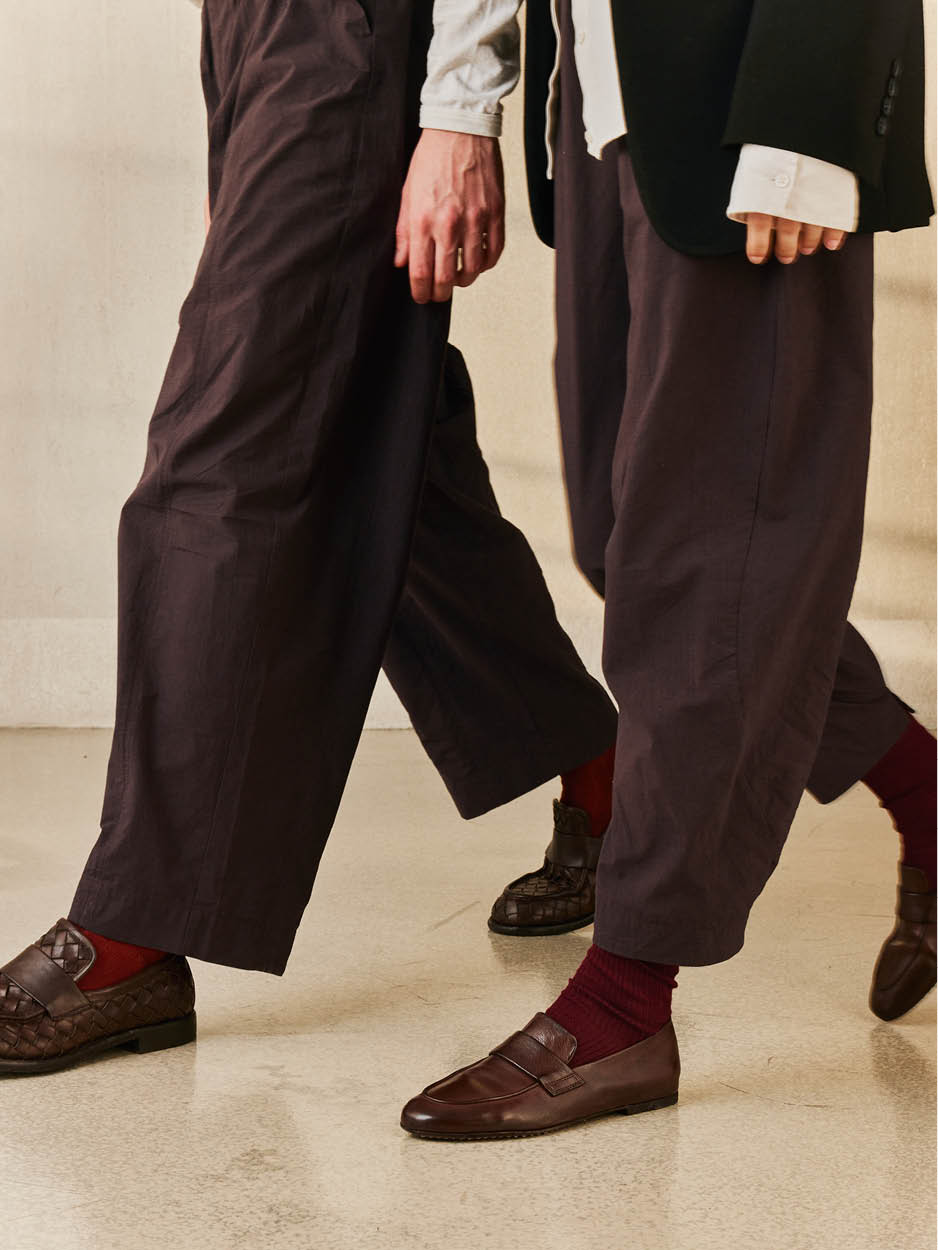 Officine Creative - Brown leather double monk strap loafers paired with burgundy socks and cropped trousers